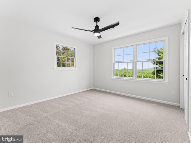 357 Avis Mill Rd, Pilesgrove, NJ 08098 - spare room featuring plenty of natural light, a ceiling fan, and carpet flooring