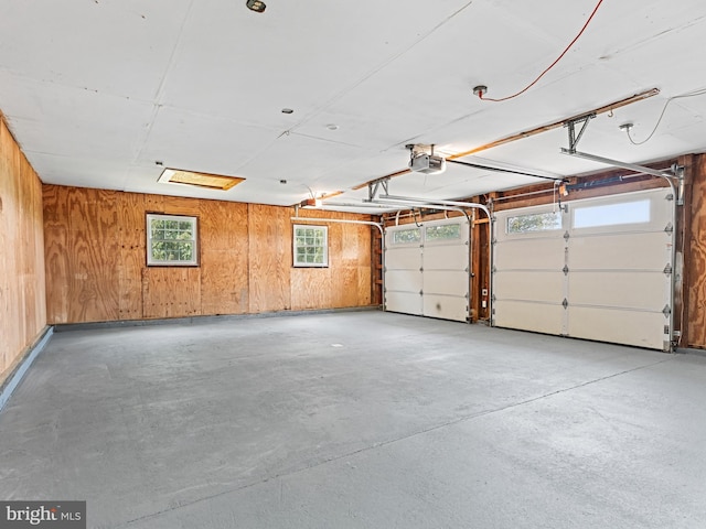357 Avis Mill Rd, Pilesgrove, NJ 08098 - garage featuring wooden walls and a garage door opener