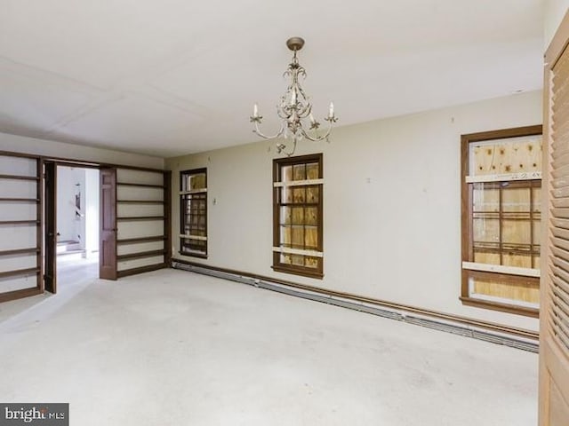 23 Nelson Ridge Rd, Princeton, NJ 08540 - spare room featuring a chandelier and light colored carpet