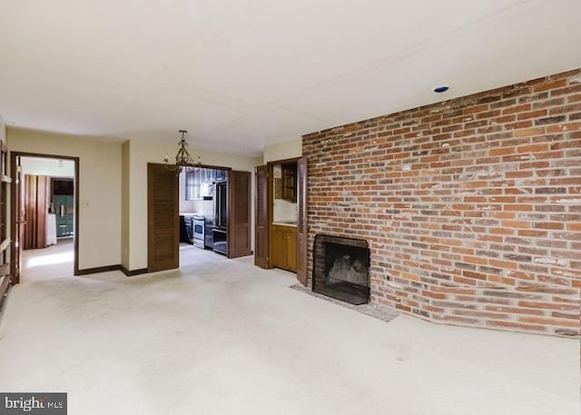 23 Nelson Ridge Rd, Princeton, NJ 08540 - unfurnished living room featuring a fireplace, a chandelier, and light carpet