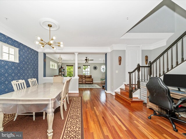 12404 Carriage Park Pl, Clarksburg, MD 20871 - dining space with wood finished floors, stairway, wallpapered walls, a chandelier, and crown molding
