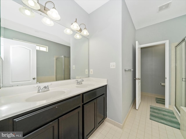 12404 Carriage Park Pl, Clarksburg, MD 20871 - bathroom with a stall shower, double vanity, and tile patterned floors