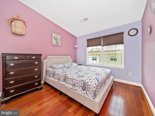 12404 Carriage Park Pl, Clarksburg, MD 20871 - bedroom with hardwood / wood-style flooring and vaulted ceiling