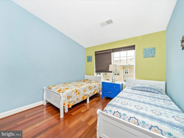 12404 Carriage Park Pl, Clarksburg, MD 20871 - bedroom with wood finished floors and baseboards