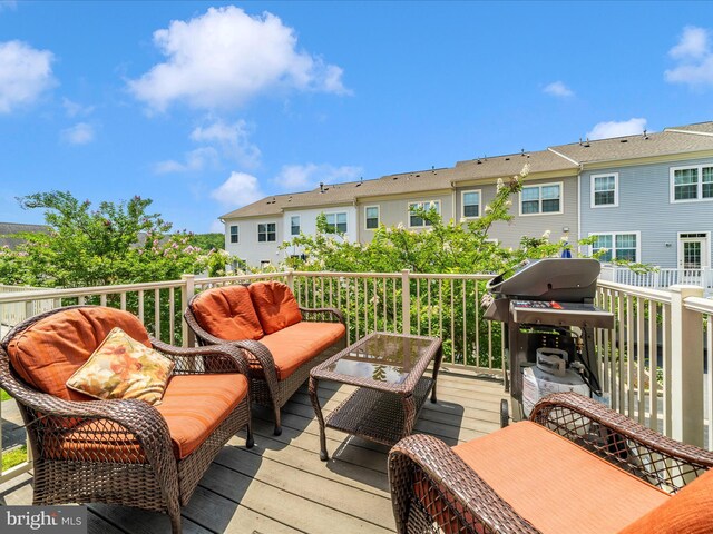 12404 Carriage Park Pl, Clarksburg, MD 20871 - deck with a grill, outdoor lounge area, and a residential view