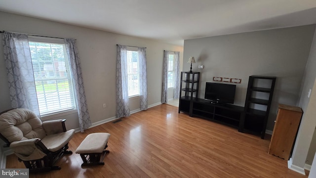 1055 View St, Hagerstown, MD 21742 - living area featuring healthy amount of natural light and wood finished floors