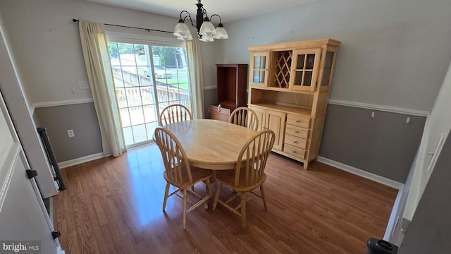 1055 View St, Hagerstown, MD 21742 - dining space featuring wood finished floors and a chandelier