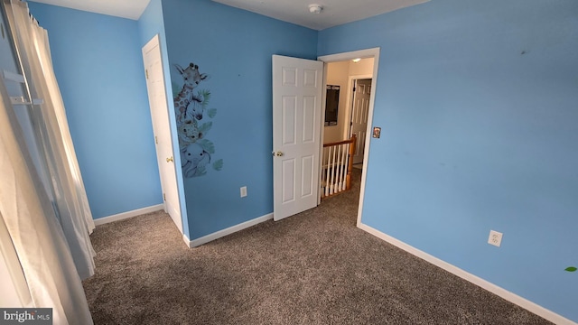 1055 View St, Hagerstown, MD 21742 - unfurnished bedroom with dark carpet and baseboards