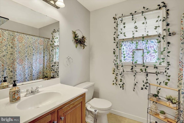 311 Woodside, West Lawn, PA 19609 - full bath with vanity, plenty of natural light, tile patterned flooring, and curtained shower