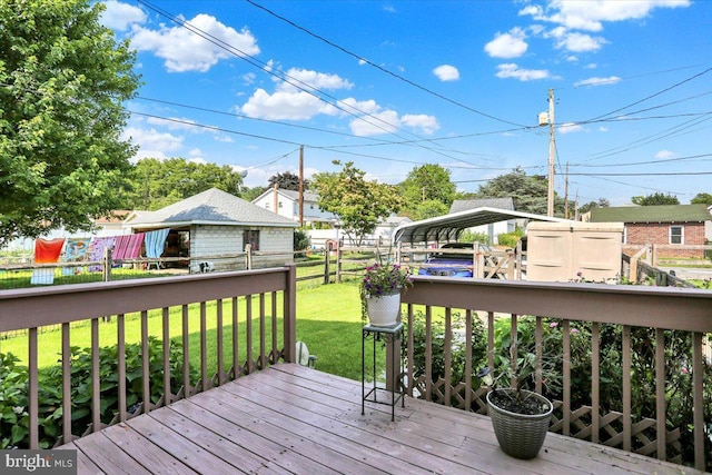 311 Woodside, West Lawn, PA 19609 - deck featuring a fenced backyard and a carport