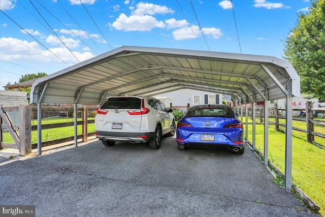 311 Woodside, West Lawn, PA 19609 - view of parking / parking lot featuring a detached carport