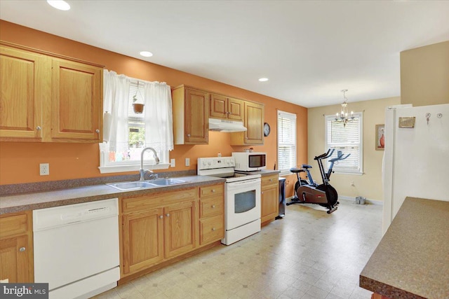 311 Woodside, West Lawn, PA 19609 - kitchen featuring white appliances, under cabinet range hood, a chandelier, pendant lighting, and recessed lighting