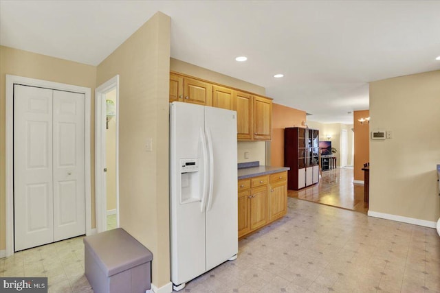311 Woodside, West Lawn, PA 19609 - kitchen featuring white fridge with ice dispenser, recessed lighting, and light flooring