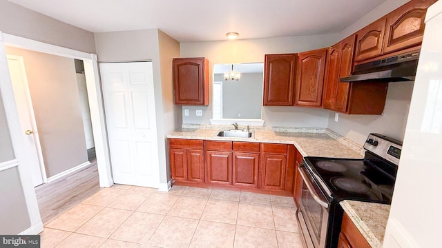 1000 Old Forge Rd, New Castle, DE 19720 - kitchen featuring electric stove, under cabinet range hood, brown cabinetry, and light tile patterned flooring