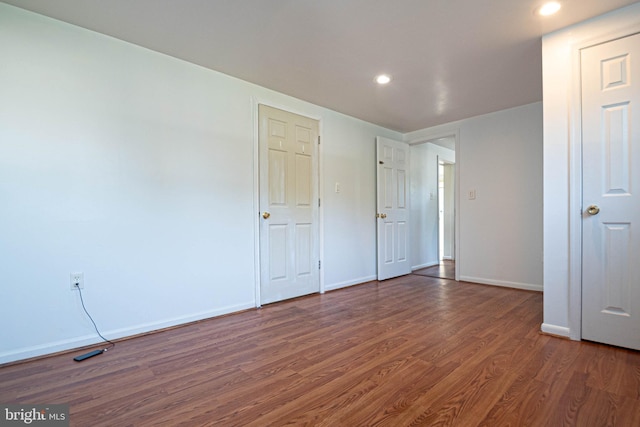 1262 Everett Ave, Woodbridge, VA 22191 - unfurnished bedroom with wood finished floors and recessed lighting