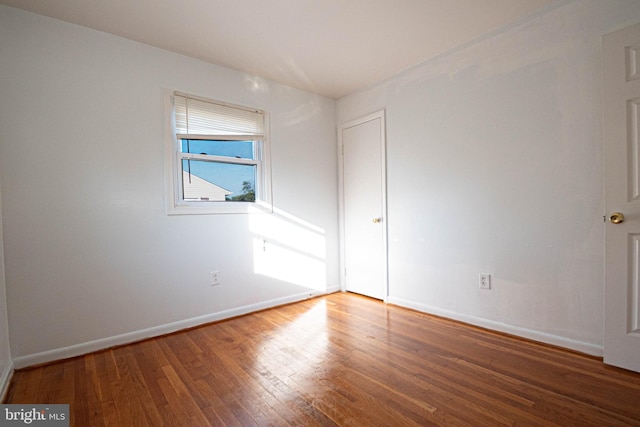 1262 Everett Ave, Woodbridge, VA 22191 - unfurnished bedroom with hardwood / wood-style floors and baseboards