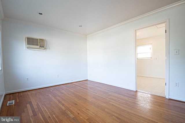 1262 Everett Ave, Woodbridge, VA 22191 - unfurnished room with a wall unit AC, ornamental molding, and wood finished floors