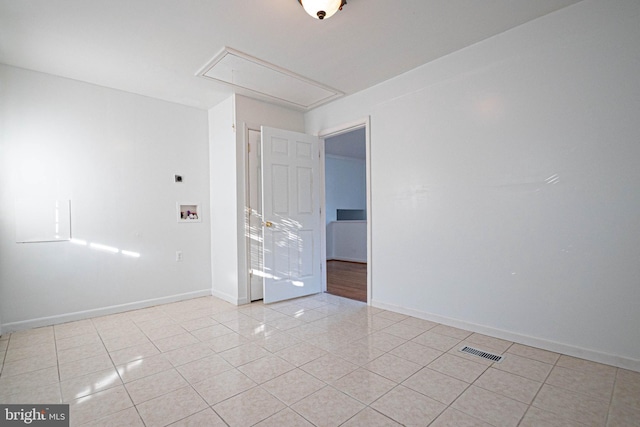 1262 Everett Ave, Woodbridge, VA 22191 - spare room with attic access and light tile patterned floors