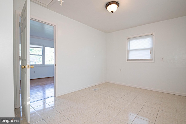 1262 Everett Ave, Woodbridge, VA 22191 - unfurnished room with light tile patterned flooring and baseboards