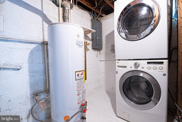 1262 Everett Ave, Woodbridge, VA 22191 - laundry room featuring gas water heater, stacked washer / drying machine, and electric panel