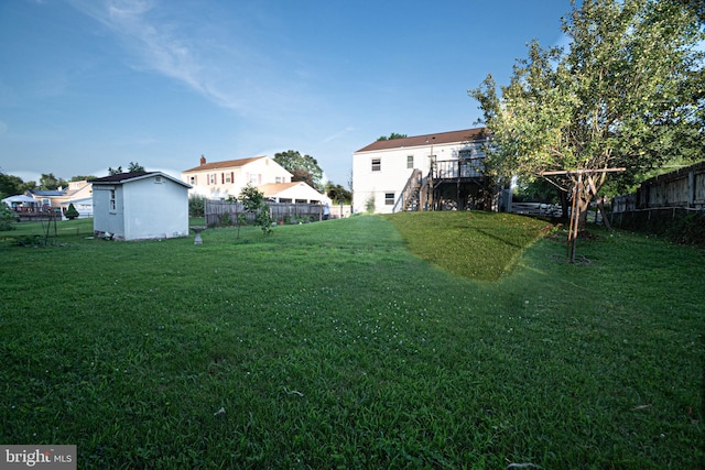 1262 Everett Ave, Woodbridge, VA 22191 - fenced backyard featuring stairway, a shed, and a wooden deck