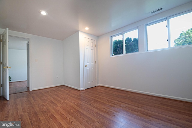 1262 Everett Ave, Woodbridge, VA 22191 - unfurnished bedroom with wood finished floors and recessed lighting