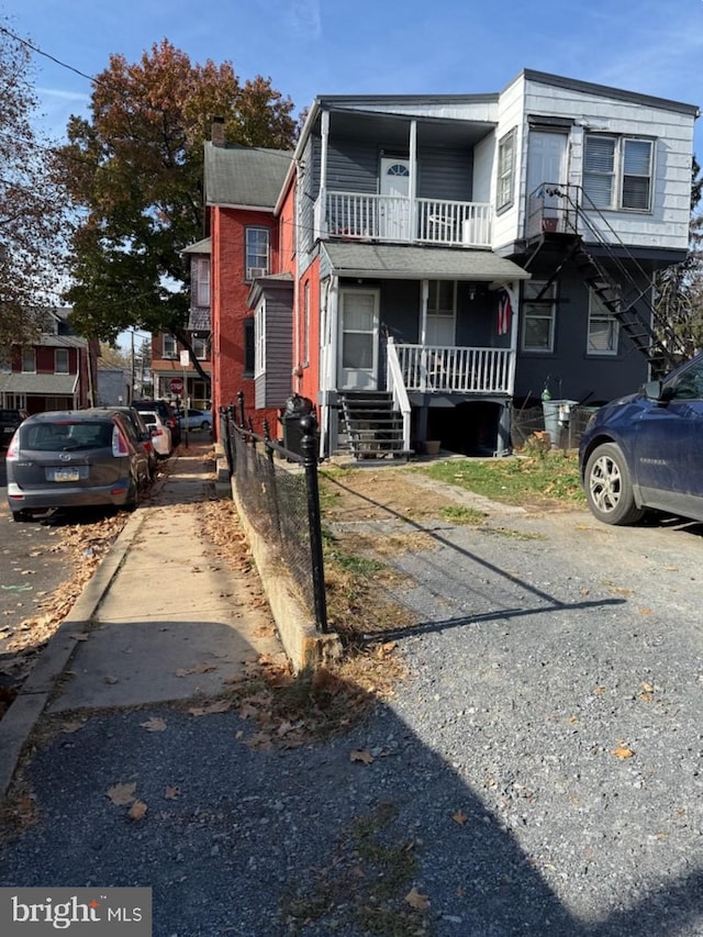 47 S Marshall St, Lancaster, PA 17602 - multi unit property with a porch, a balcony, and a chimney