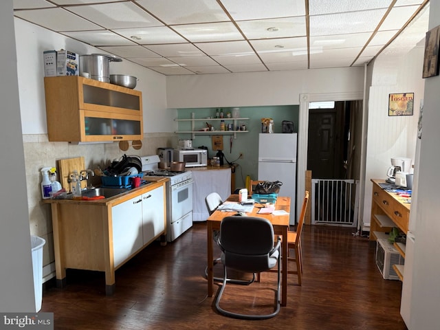 47 S Marshall St, Lancaster, PA 17602 - kitchen featuring white appliances, a paneled ceiling, dark wood-type flooring, white cabinetry, and open shelves