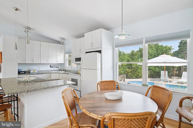 365 Dusty Miller Dr, Long Beach, NJ 08008 - dining space with vaulted ceiling