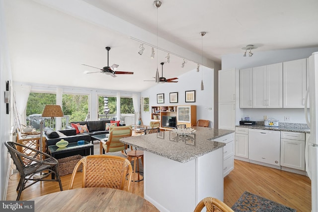365 Dusty Miller Dr, Long Beach, NJ 08008 - kitchen with white dishwasher, lofted ceiling, a ceiling fan, open floor plan, and a kitchen island