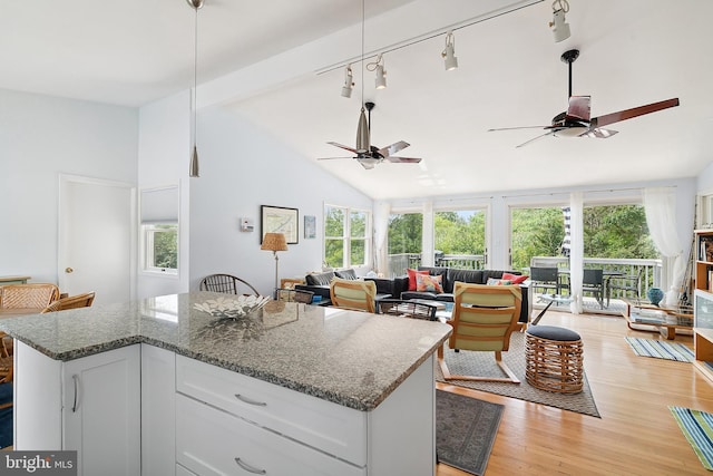 365 Dusty Miller Dr, Long Beach, NJ 08008 - kitchen featuring a ceiling fan, healthy amount of natural light, light wood-style floors, white cabinets, and high vaulted ceiling