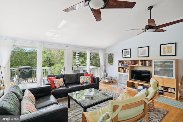 365 Dusty Miller Dr, Long Beach, NJ 08008 - living area with ceiling fan, wood finished floors, and vaulted ceiling