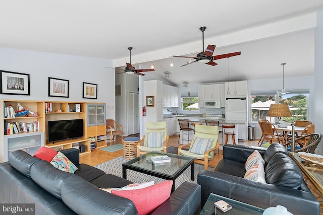 365 Dusty Miller Dr, Long Beach, NJ 08008 - living room featuring ceiling fan, light wood-style floors, and healthy amount of natural light
