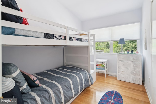 365 Dusty Miller Dr, Long Beach, NJ 08008 - bedroom featuring lofted ceiling and wood finished floors