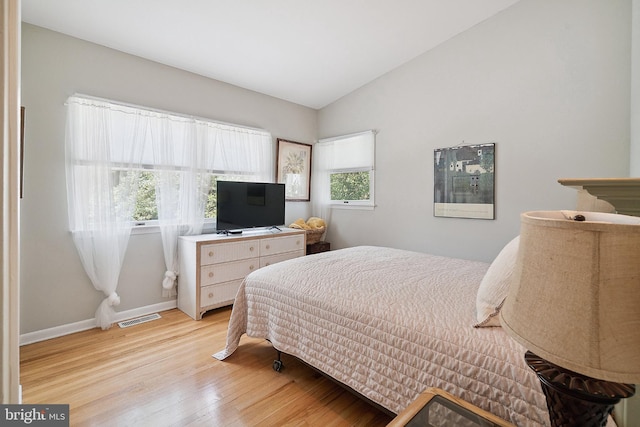 365 Dusty Miller Dr, Long Beach, NJ 08008 - bedroom featuring light wood-type flooring and vaulted ceiling