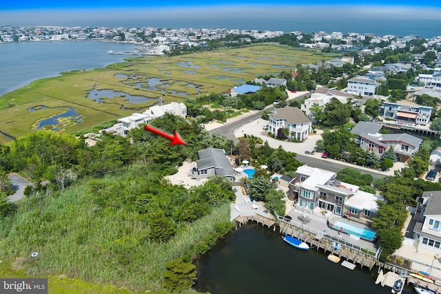 365 Dusty Miller Dr, Long Beach, NJ 08008 - aerial view of residential area with a nearby body of water