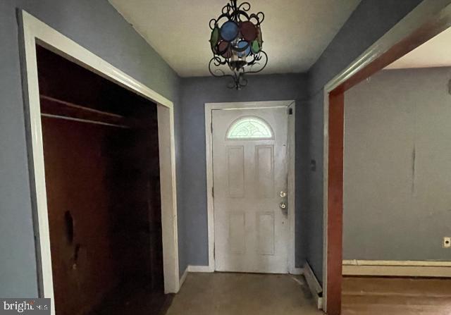 3001 Church Rd, Cherry Hill, NJ 08002 - foyer with baseboards and a chandelier