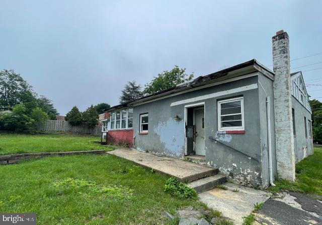 3001 Church Rd, Cherry Hill, NJ 08002 - back of property featuring a chimney and stucco siding
