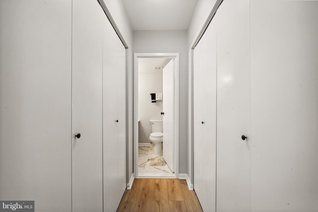 9733 Kings Crown Ct Unit 202, Fairfax, VA 22031 - hall featuring light wood-style flooring and baseboards