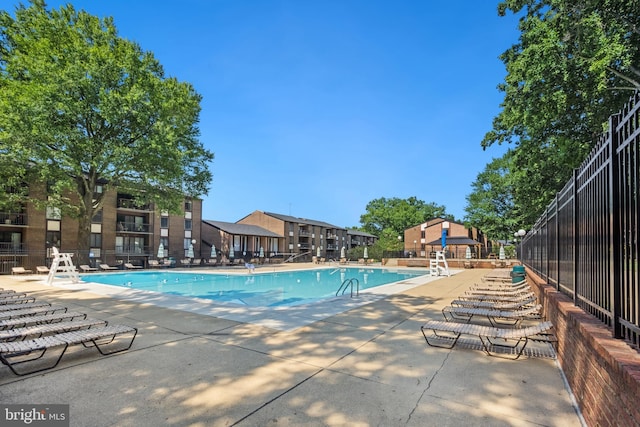 9733 Kings Crown Ct Unit 202, Fairfax, VA 22031 - community pool with a patio area