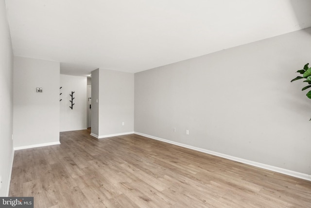 9733 Kings Crown Ct Unit 202, Fairfax, VA 22031 - spare room with light wood-style floors and baseboards