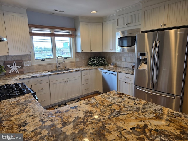 3923 Atlantic Brigantine Blvd Unit B, Brigantine, NJ 08203 - kitchen featuring appliances with stainless steel finishes, tasteful backsplash, light stone countertops, and recessed lighting