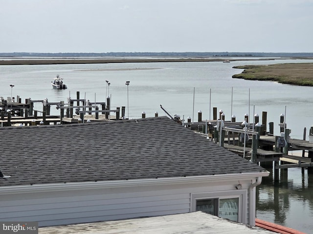 3923 Atlantic Brigantine Blvd Unit B, Brigantine, NJ 08203 - exterior space featuring a shingled roof, gutters, nearby water, and boat lift