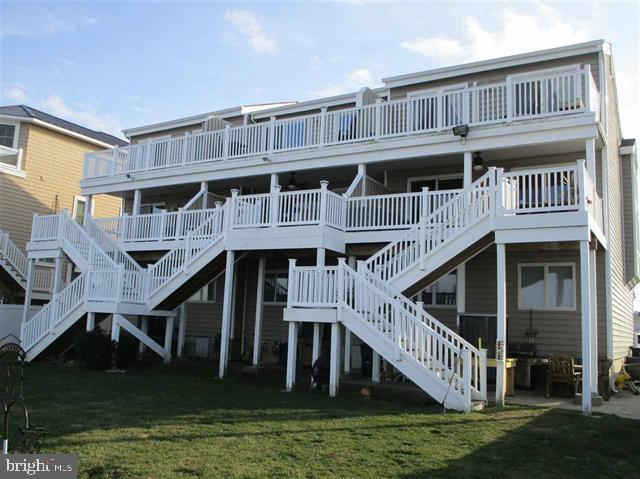 3923 Atlantic Brigantine Blvd Unit B, Brigantine, NJ 08203 - rear view of house featuring stairs and a yard
