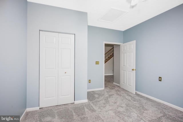 4938 Brightleaf Ct Unit 4938, Baltimore, MD 21237 - unfurnished bedroom featuring carpet floors, attic access, and a closet