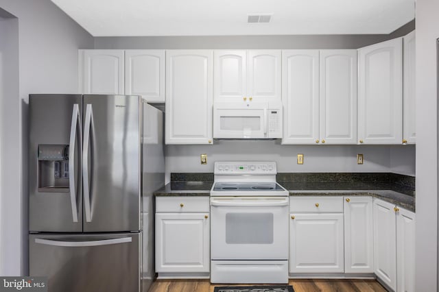 4938 Brightleaf Ct Unit 4938, Baltimore, MD 21237 - kitchen with white appliances, white cabinetry, wood finished floors, and dark stone counters