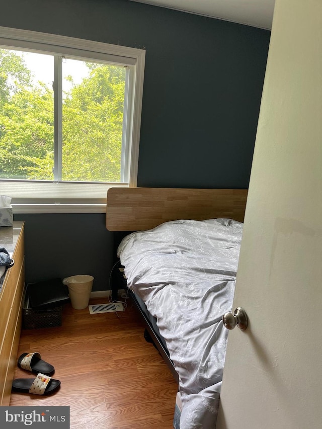 1020 Queens Ct, Herndon, VA 20170 - bedroom with wood finished floors