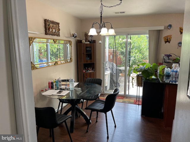 1020 Queens Ct, Herndon, VA 20170 - dining space featuring wood finished floors and a chandelier