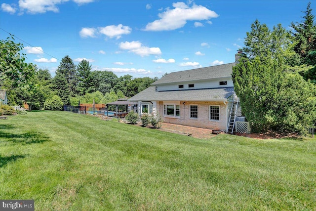 1420 Valley Rd, Lancaster, PA 17603 - rear view of property with a chimney and a yard