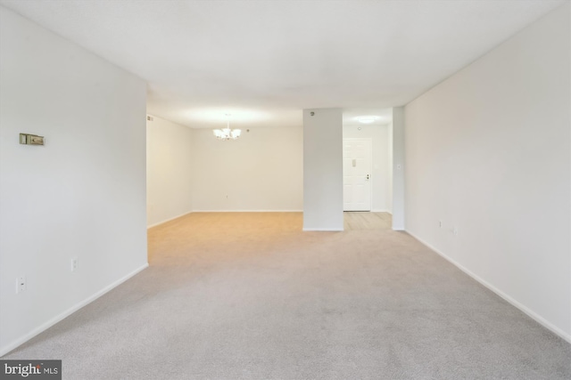 15115 Interlachen Dr Unit 3-415, Silver Spring, MD 20906 - unfurnished room with a chandelier and light carpet